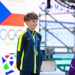 Olympiádu dětí a mládeže letos hostí Jihočeský kraj. Podívejte se na pondělní medailový ceremoniál prostřednictvím fotografií Václava Pancera.