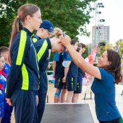 Olympiádu dětí a mládeže letos hostí Jihočeský kraj. Podívejte se na pondělní medailový ceremoniál prostřednictvím fotografií Václava Pancera.